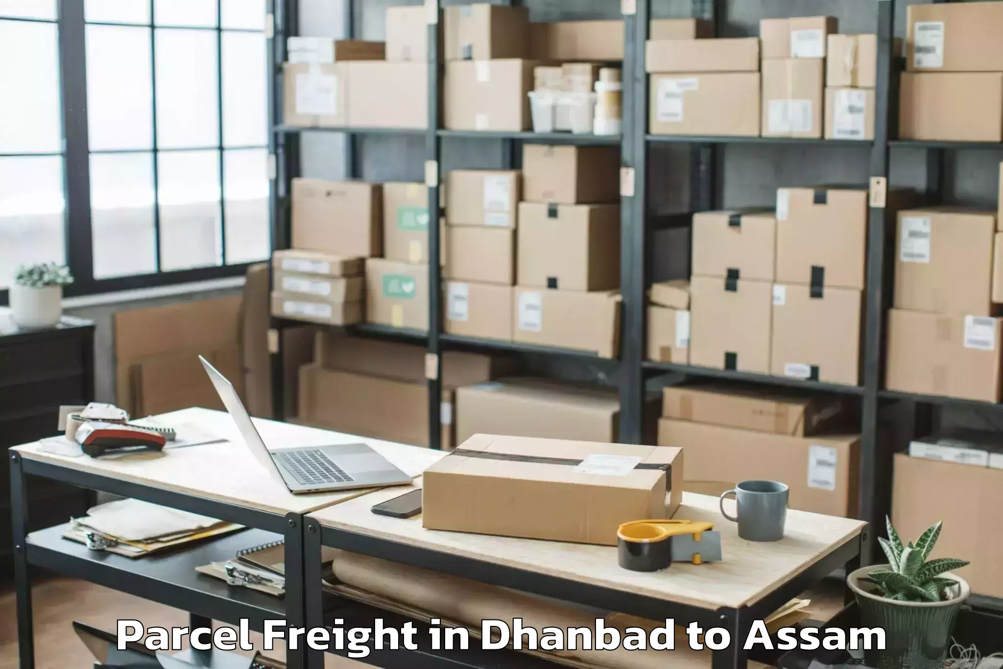 Book Dhanbad to Mirza Parcel Freight